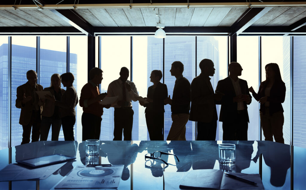 Group of Business People Talking in a Meeting